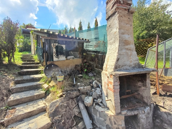Predaj, záhradný pozemok   401 m2 Handlová, Sídlisko Mostná, Chatová oblasť "Nad Lidlom"