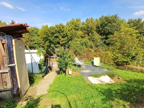 Predaj, záhradný pozemok   401 m2 Handlová, Sídlisko Mostná, Chatová oblasť "Nad Lidlom"